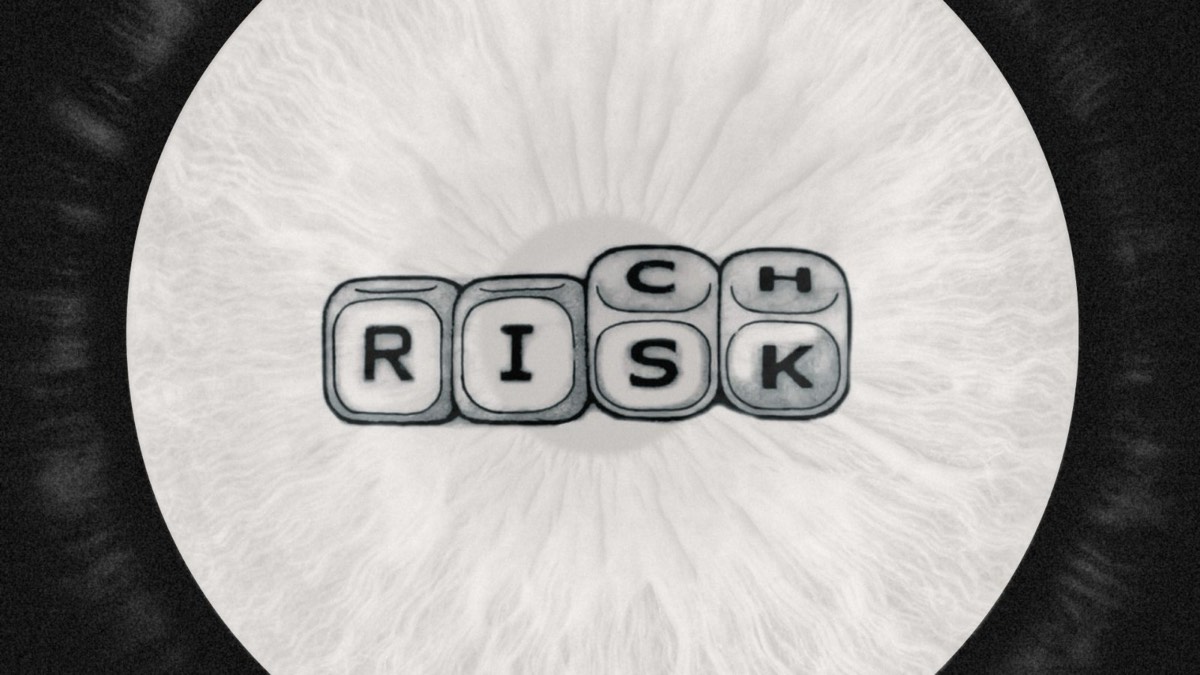 Lettered dice inside a pale iris, mid-turn between the words RISK and RICH.